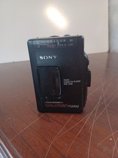 Lot of 2 VINTAGE SONY WALKMAN FOR PARTS OR REPAIR