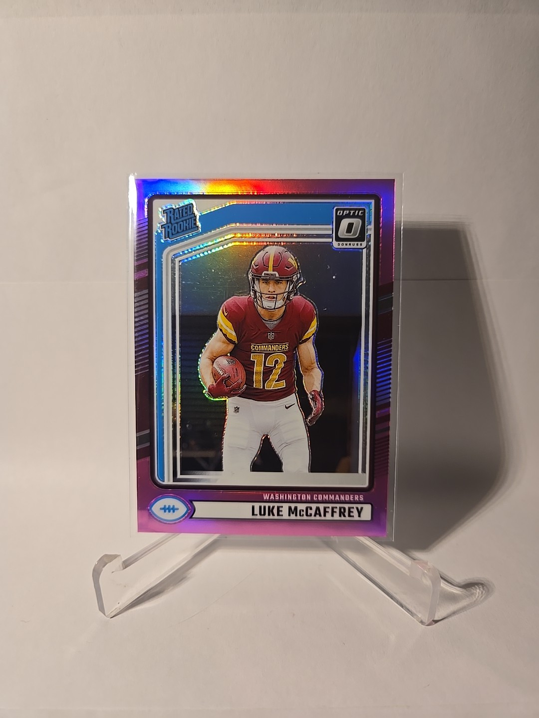 2024 Panini Donruss - Rated Rookie Luke McCaffrey #302 Optic Preview Pink Prizm