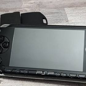 Sony PSP-1001 Console with Battery, Charger and 3 Games Bundle - USA