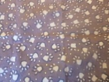 Brown paw prints on brown Cotton Fabric 44" Wide x 12 " long