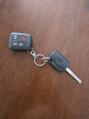 Ford N153 Remote, 4 Button And Key Car Control  - image 1 of 3