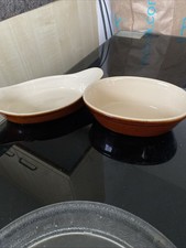2 Pieces Of Earthenware Pottery With Numbers On The Bottom 