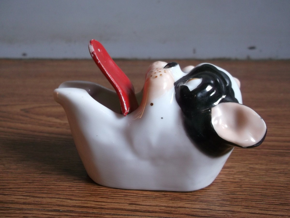 Rare vintage unique tongue movement dog face ashtray of 40's made