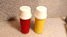 vintage Tupperware ketchup and mustard dispenser