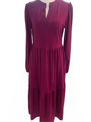 burgundy long flowy dress Luxurious flowy burgundy dress with a high neck