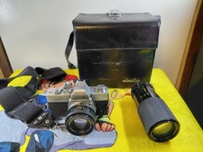 Minolta SRT 100 35mm SLR Camera Bundle with Lenses  Case
