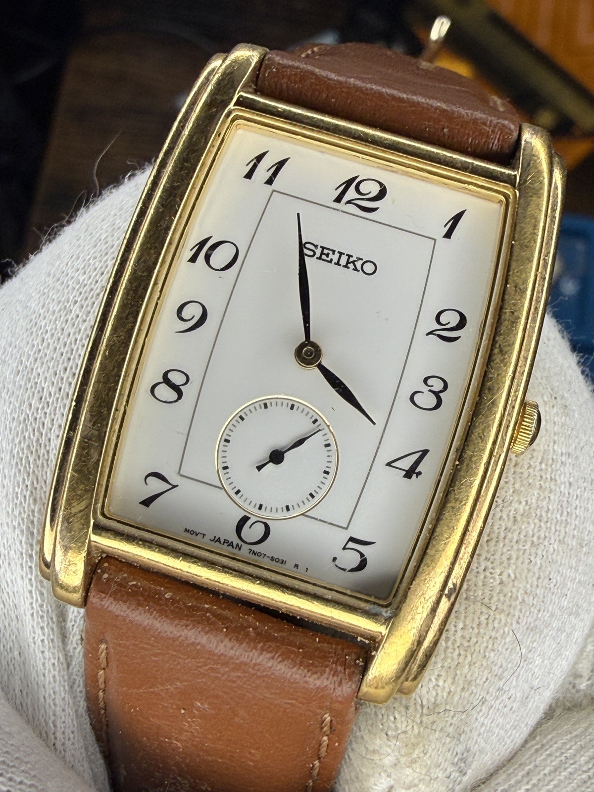 Watch Men rare New Battery Tone Dial 7N07-5019 White Gold Tank Rectangle Seiko - VintageWatches.PK Watch Men rare New Battery Tone Dial 7N07-5019 White Gold Tank Rectangle Seiko - vintagewatches.pk