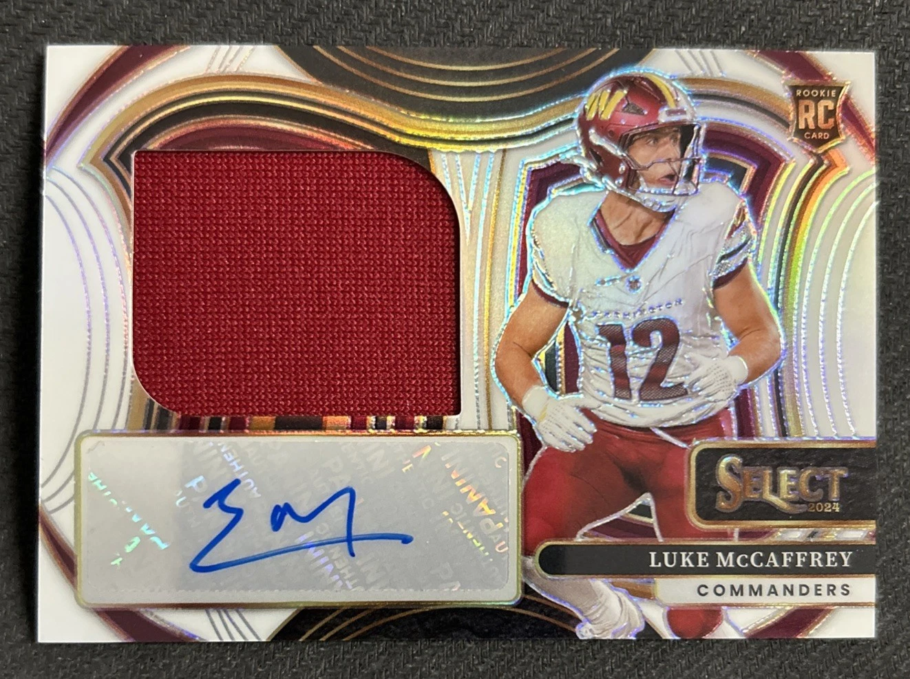 Luke McCaffrey Panini Select Jumbo Rookie Signature Swatches #JRSSLMY Base