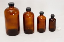 4,8,16 or 32oz Amber Boston Round Bottles w/ Black Phenolic PolyCone Lined Cap