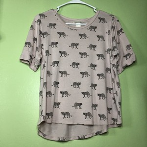 camiseta por dentro da calça masculina