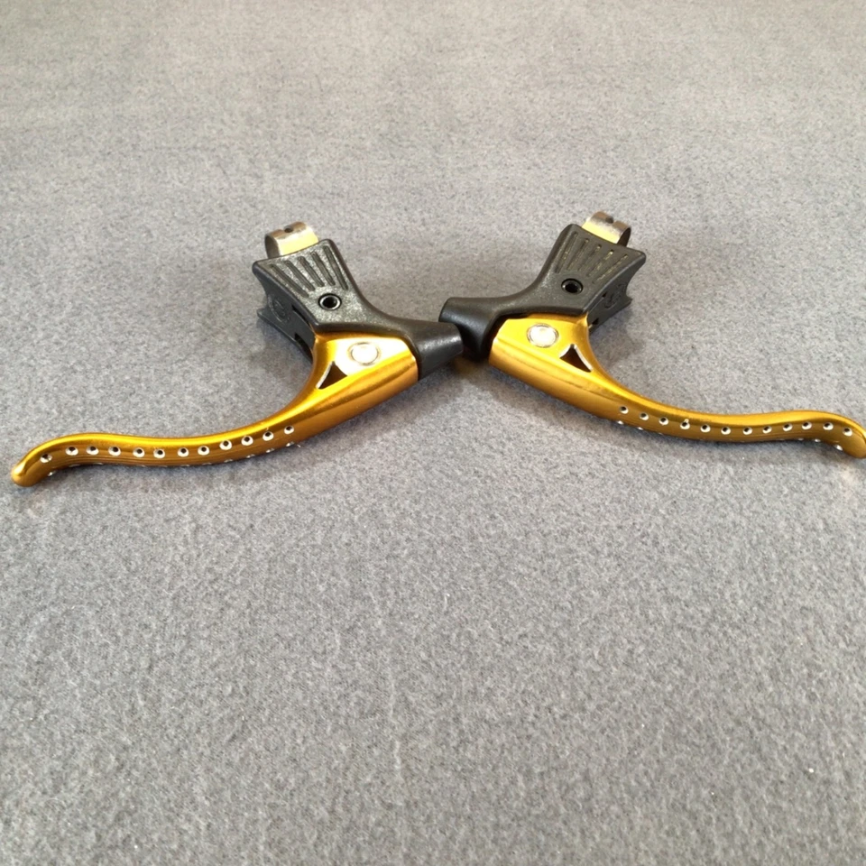 Palancas de freno de bicicleta vintage Modolo doradas y negras perforadas Foto 4 de 4