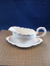 VINTAGE OFF WHITE GRAVY BOAT AND SAUCER - SCA...