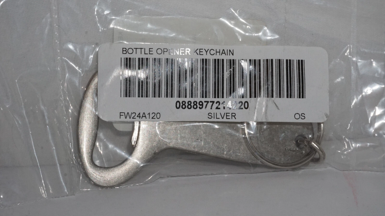 Porte clés ouvre bouteille SUPREME neuf argent