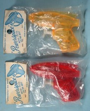 1950s 2 Spaceman Water Squirt Ray Gun Toys in Packages Sci-Fi Color Variations