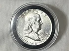 1958 United States Uncirculated Franklin Half Dollar Scratch Is On Holder