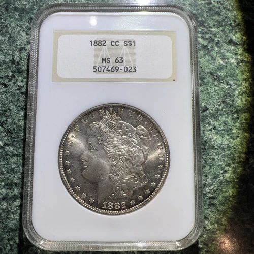 1882-CC MORGAN DOLLAR NGC MS63 Has Toning Old Style NGC Slab