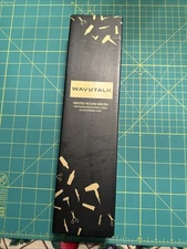 Pink Wavytalk heated round brush for super smooth curls volumizing hair.