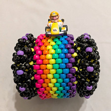     Mario Kart Themed Kandi Rotator Cuff Bracelet Wario Figure Black and Purple