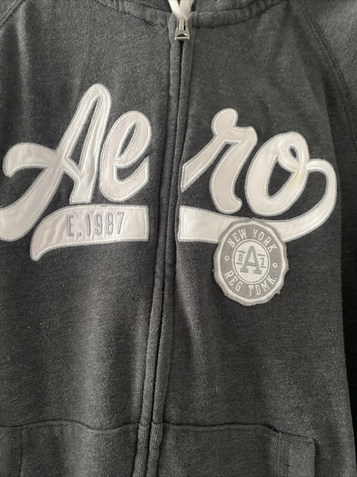 JUNIORS Aeropostal Hoddie (Juniors Talla L) / Gris Oscuro Foto 3 de 4