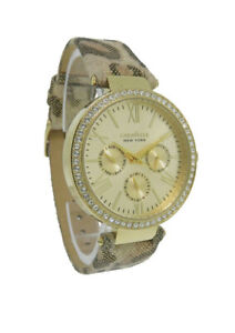 Caravelle New York 44N103 Women's Round Gold Tone Leopard Analog Day Date Watch
