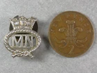 An original WW2 silver Merchant Navy official issue 'MN' war service lapel badge