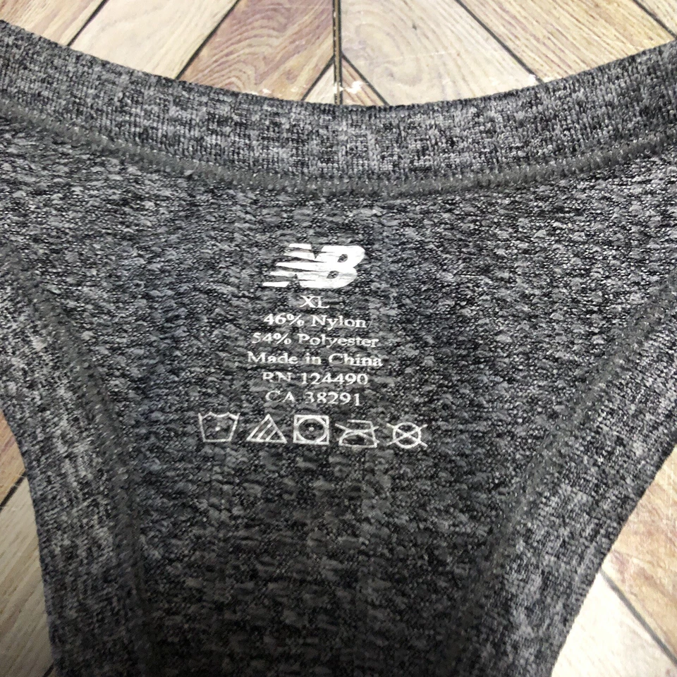 Camiseta sin mangas New Balance gris Active Wear para mujer. Talla XL Foto 3 de 4