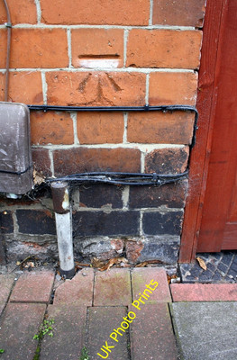 Photo 6x4 Benchmark on #41 Burder Street Loughborough Ordnance Survey cut c2015