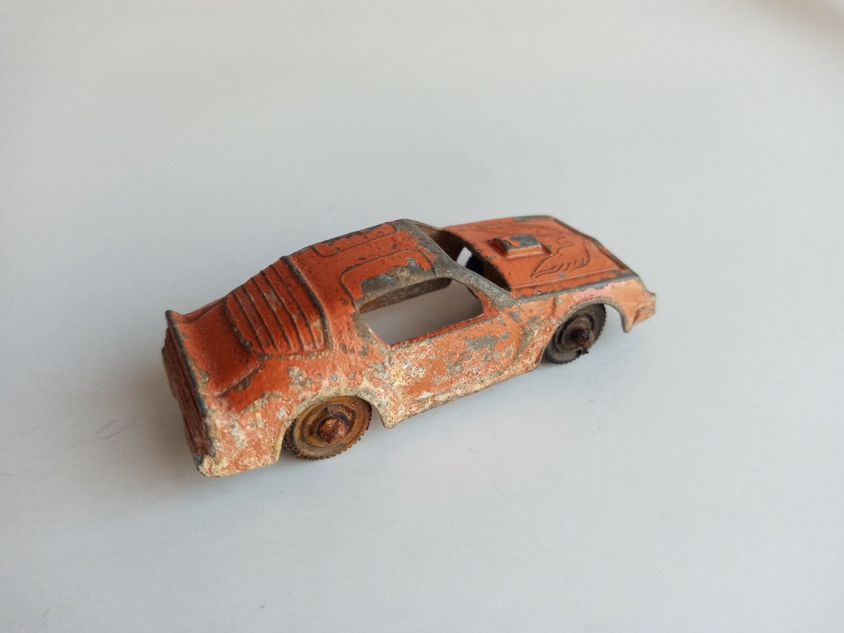 Orange TootsieToy Pontiac Firebird Trans Am Heavily Corroded