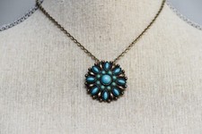 Silver tone turquoise colored Flower Pendant statement necklace