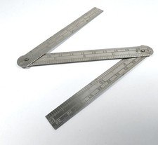 O Fisher & Co leather cased folding steel rule 12" No 13M