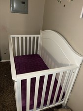 White Wooden Crib Bed with Purple Mattress for Kids and Babies