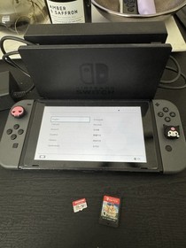 Nintendo Switch With Accessories and (256gb) micro sd card and 1 game included. 