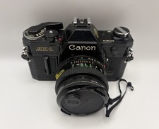Canon AE-1 35mm SLR Film Camera W/ 50mm FD Film Lens Tested  Working Great 