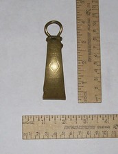 The EUREKA Vintage BRASS SKIRT LIFTER - Registered 1877