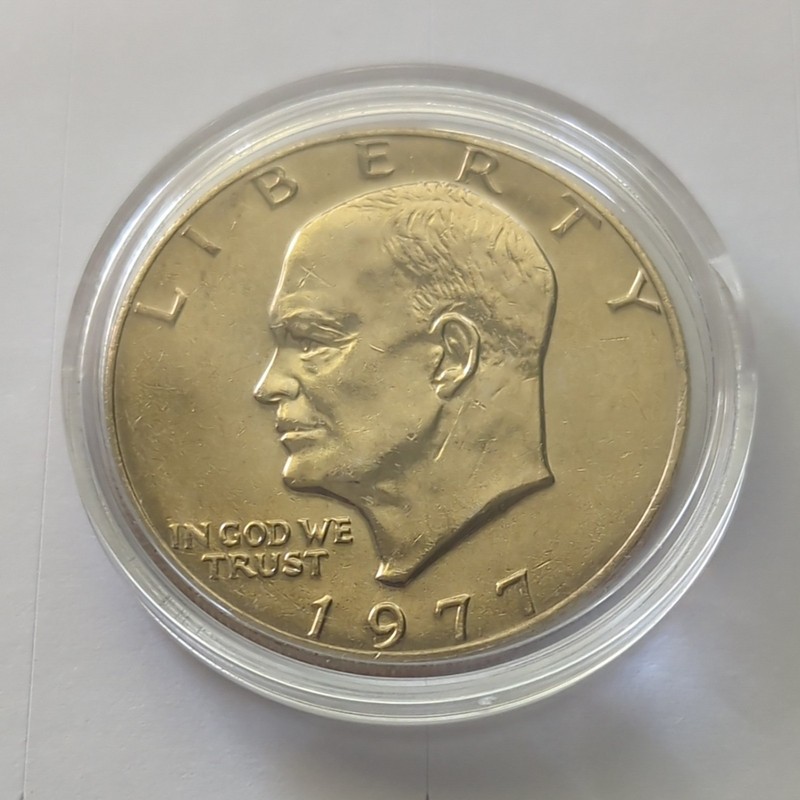 1977 (P) Eisenhower Dollar AU, Toned in Capsule