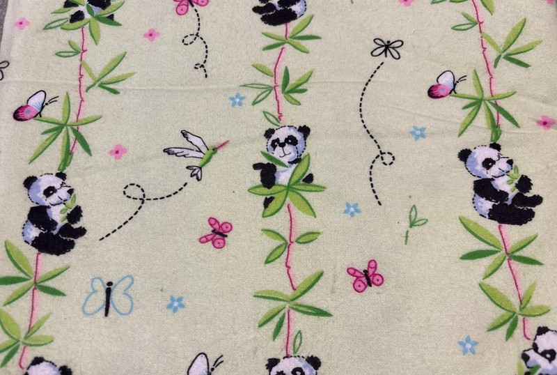 Quilting Cotton Flannel Fabric “Pandas”, 2008 Print, Lime with colorful accents.