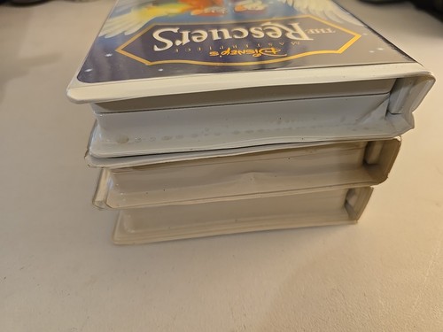 3 DISNEY'S MASTERPIECE LOT VHS THE LION KING THE RESCUERS THE SWORD IN THE STONE - Picture 16 of 19