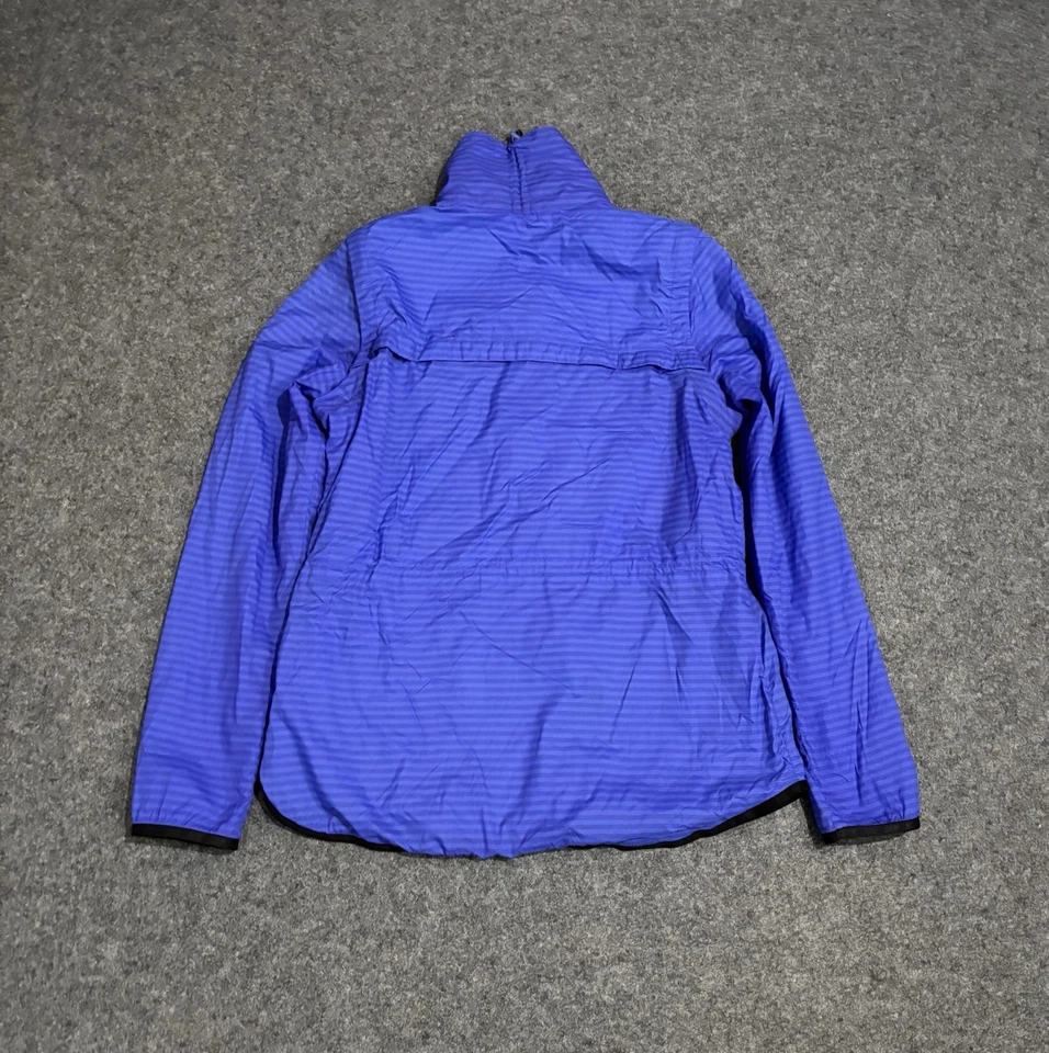 Chaqueta convertible Nike Golf 2 en 1 Majors Flight para mujer azul medio cremallera completa Foto 2 de 4