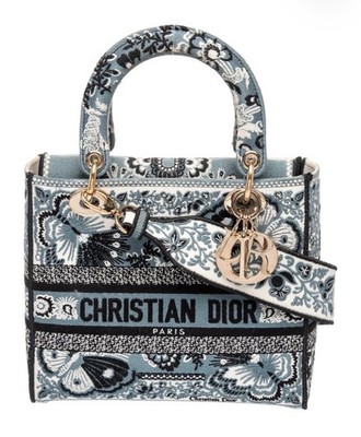 Christian Dior new in box, bought for 6200 two years ago never used it