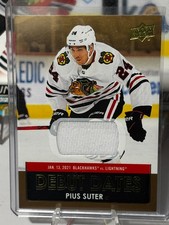 2021-22 Upper Deck Pius Suter Jersey Debut Dates Gold #DD-19 Blackhawks