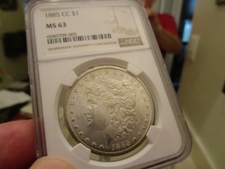 A NICE WHITE BETTER DATED 1885 CC MORGAN DOL NGC MS 63 NICE FOR THE GRADE