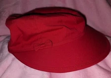 RED HAT women's large billed visor with cute red bow on the side. Great cond.