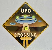 Listing image for Vintage UFO Crossing Metal Tin Sign ET Extraterrestrial Space Flying Saucer NOS