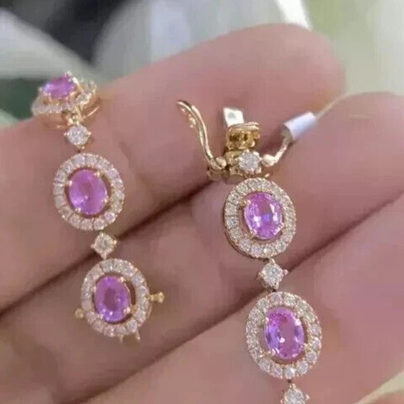 Brazalete tenis zafiro rosa creado en laboratorio corte ovalado de 8,00 quilates enchapado en oro amarillo de 14 quilates Foto 2 de 4