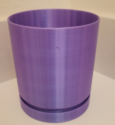 Purple plant plot with built in drainage 