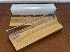 Handmade dispenser for storing cling film or foil Handy and reliable