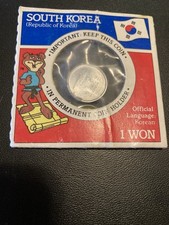 South Korea 1969 Uncirculated 1 Won Coin in Permanent Holder Golden Crisp Prize