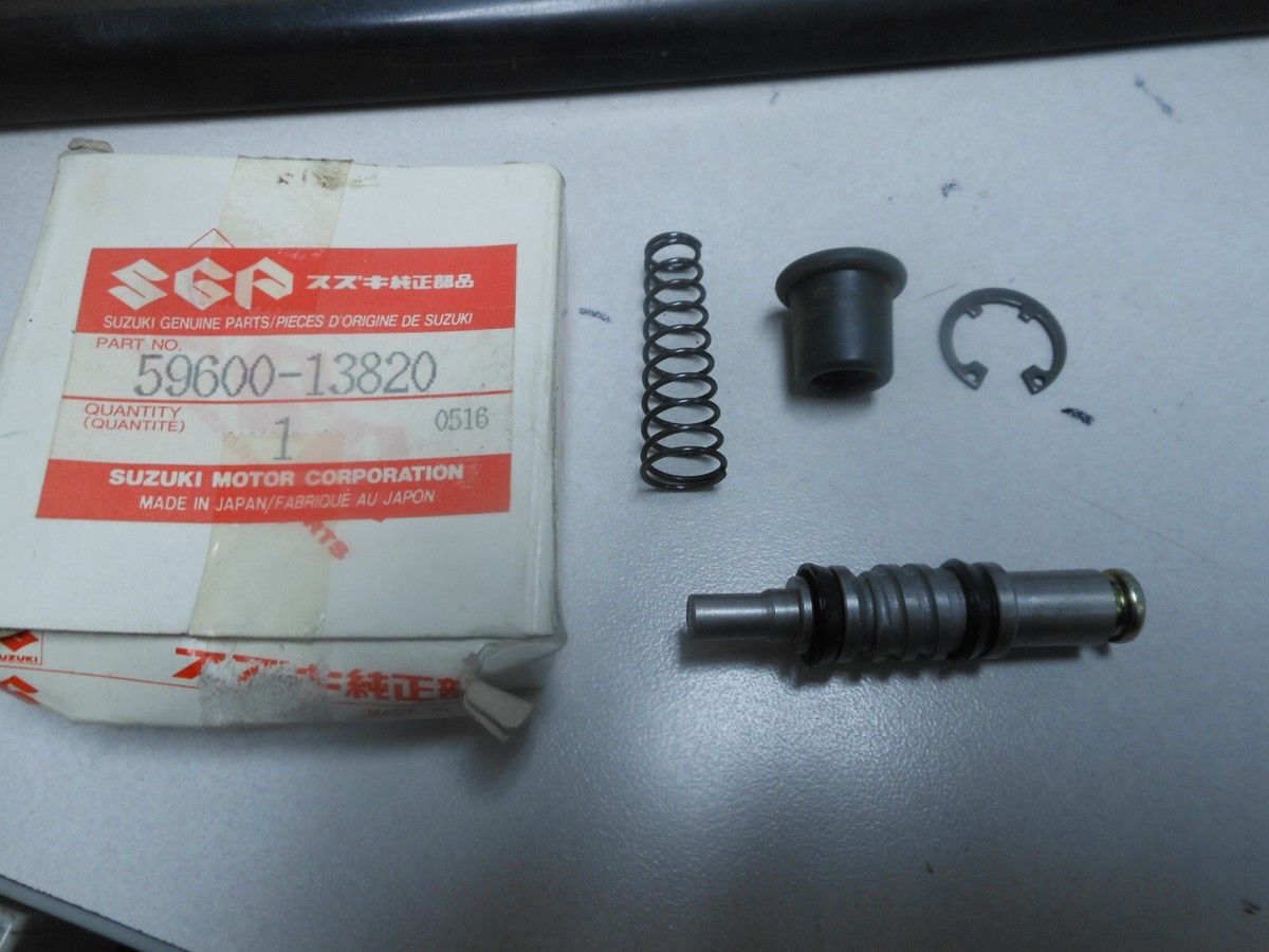 NOS Suzuki OEM Piston/Cup Set 84-89 TS250 86-88 DR125 86-88 SP125