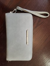 Steve Madden Wristlet Wallet in a gray color. Lightly Used