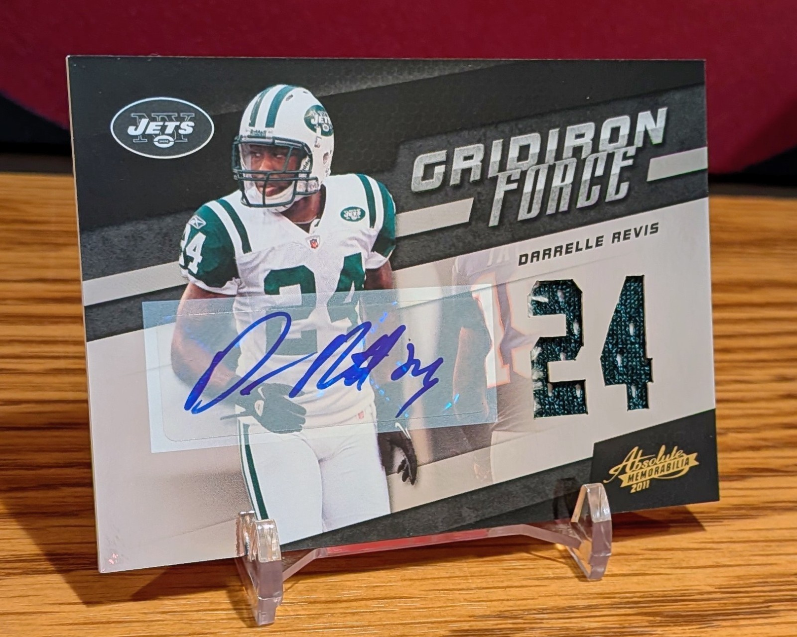 DARRELLE REVIS 2011 ABSOLUTE GRIDIRON FORCE JETS PATCH AUTO #1/5 *GAME-USED* view 1